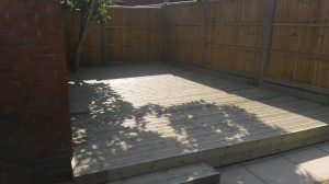 DECKING TO COVER AN UNSIGHTLY PATIO