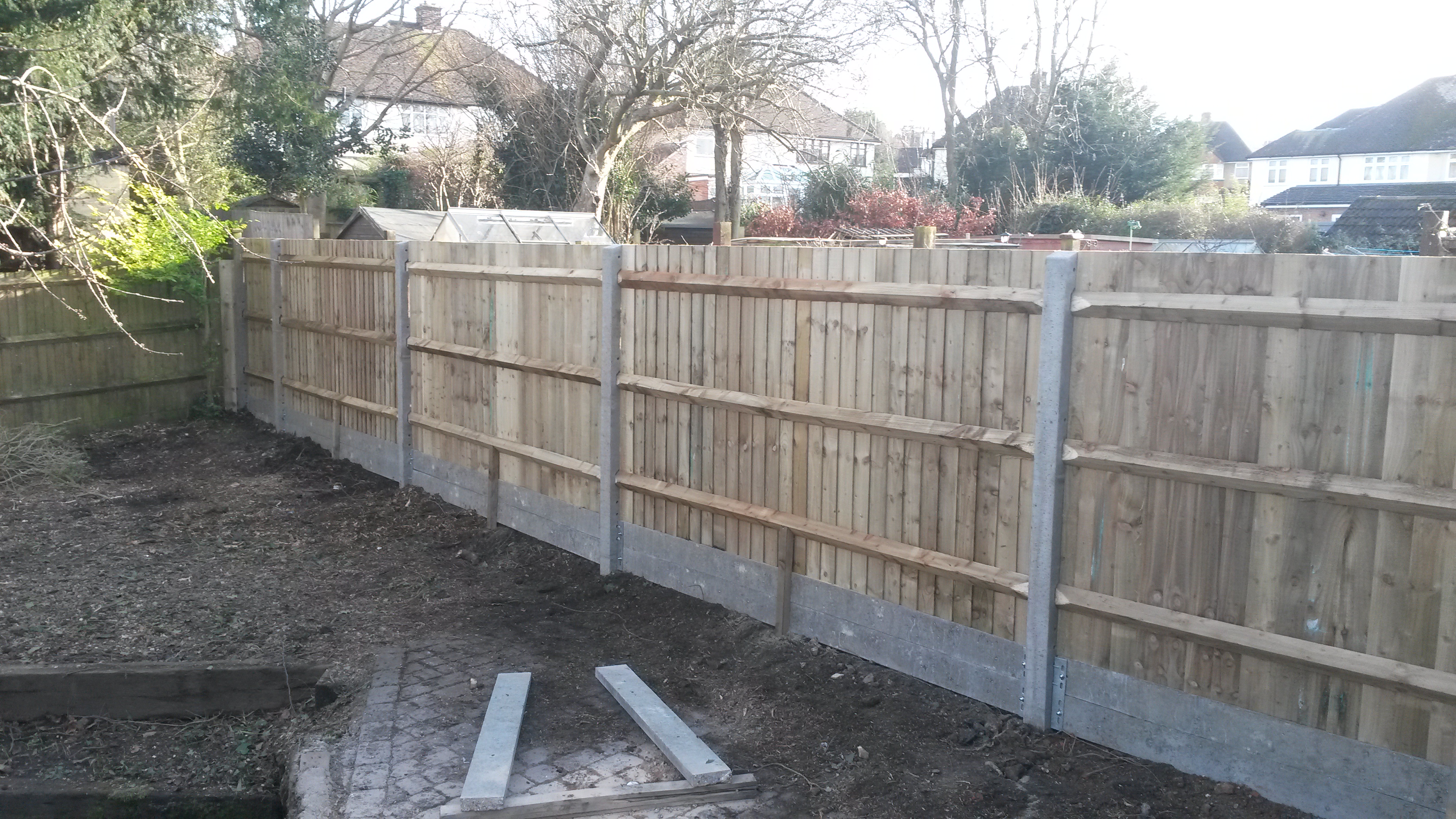 A CLOSEBOARD FENCE TO RETAIN NEW SOIL LEVELS... Quality Fencing and Gates